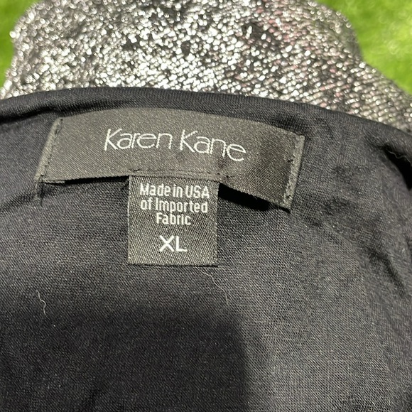 Ladies black and silver sleeveless top with peplum. - Picture 3 of 5